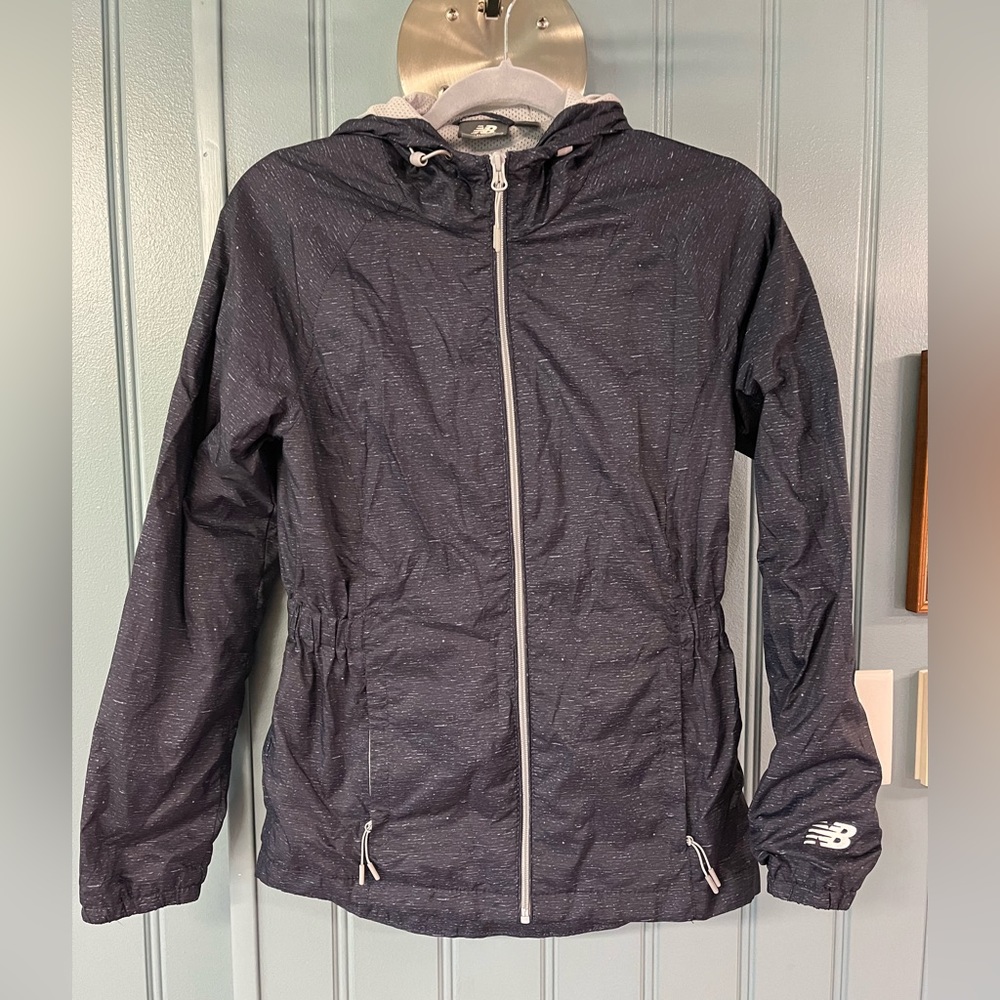 New Balance women’s size small water resistant jacket.  Size small.